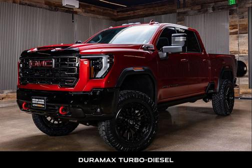 Volcanic Red Tintcoat 2025 GMC Sierra 2500 AT4X