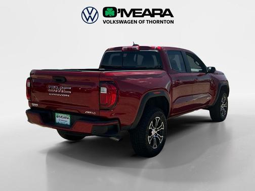 Volcanic Red Tintcoat 2024 GMC Canyon AT4