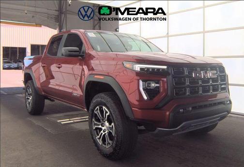 Volcanic Red Tintcoat 2024 GMC Canyon AT4
