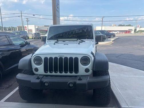 Bright White Clearcoat 2016 Jeep Wrangler Unlimited Sport