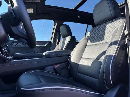 Volcanic Red Tintcoat 2026 GMC Acadia Denali