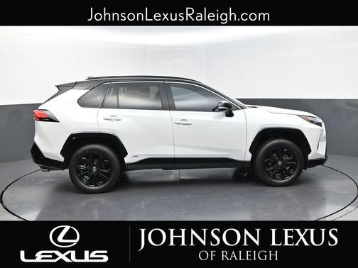 Wind Chill Pearl/Midnight Black Metallic 2023 Toyota RAV4 Hybrid SE
