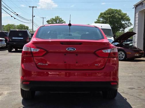 Red 2012 Ford Focus SE