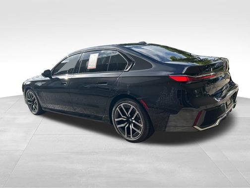 Black 2025 BMW 740 i