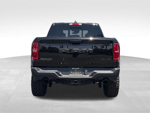 Diamond Black Crystal Pearlcoat 2026 RAM 1500 RHO Crew Cab 4x4 5'7' Box