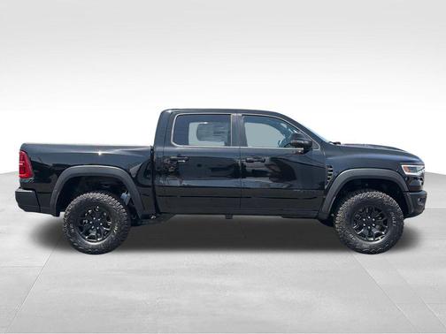 Diamond Black Crystal Pearlcoat 2026 RAM 1500 RHO Crew Cab 4x4 5'7' Box