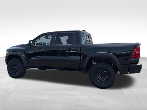 Diamond Black Crystal Pearlcoat 2026 RAM 1500 RHO Crew Cab 4x4 5'7' Box