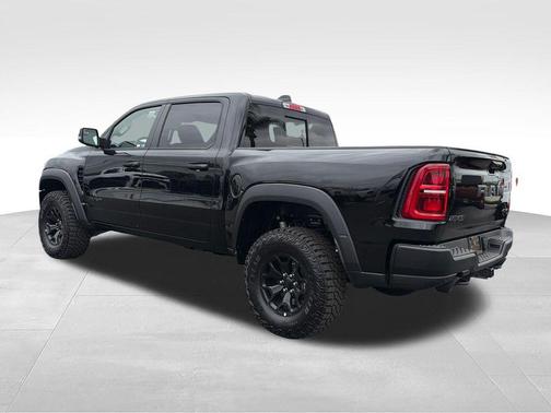 Diamond Black Crystal Pearlcoat 2026 RAM 1500 RHO Crew Cab 4x4 5'7' Box