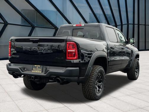 Diamond Black Crystal Pearlcoat 2026 RAM 1500 RHO Crew Cab 4x4 5'7' Box