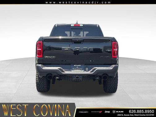 Diamond Black Crystal Pearlcoat 2026 RAM 1500 RHO Crew Cab 4x4 5'7' Box