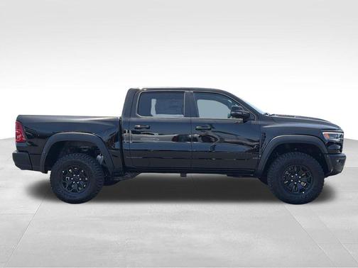 Diamond Black Crystal Pearlcoat 2026 RAM 1500 RHO Crew Cab 4x4 5'7' Box