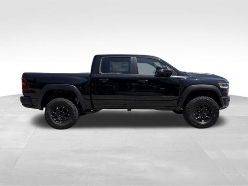 Diamond Black Crystal Pearlcoat 2026 RAM 1500 RHO Crew Cab 4x4 5'7' Box