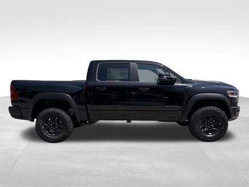 Diamond Black Crystal Pearlcoat 2026 RAM 1500 RHO Crew Cab 4x4 5'7' Box