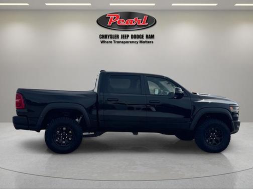 Diamond Black Crystal Pearlcoat 2026 RAM 1500 RHO Crew Cab 4x4 5'7' Box