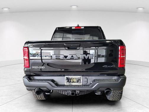 Diamond Black Crystal Pearlcoat 2026 RAM 1500 RHO Crew Cab 4x4 5'7' Box