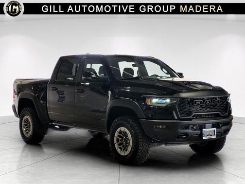 Diamond Black Crystal Pearlcoat 2026 RAM 1500 RHO Crew Cab 4x4 5'7' Box