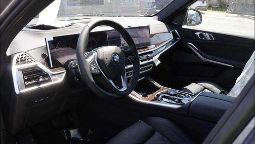 Skyscraper Grey Metallic 2026 BMW X5 PHEV xDrive50e
