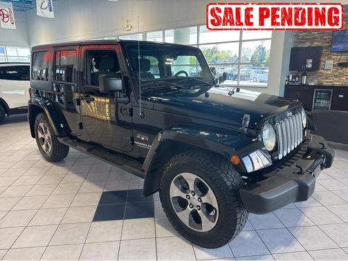 Black 2016 Jeep Wrangler Unlimited Sahara