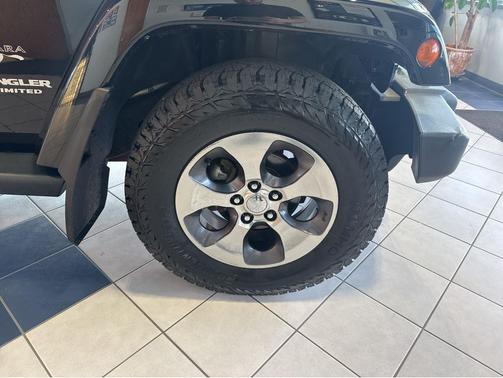 Black 2016 Jeep Wrangler Unlimited Sahara