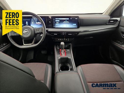 Yellow 2025 Nissan Kicks SR