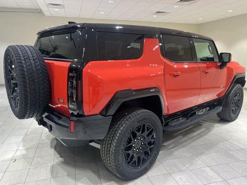 Solar Orange 2025 GMC HUMMER EV SUV 2X