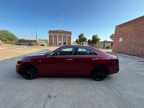 Radiant Red Tintcoat 2026 Cadillac CT4 Premium Luxury
