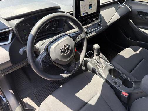 Midnight Black Metallic 2025 Toyota Corolla Hybrid LE