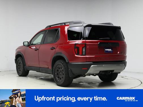 Red 2026 Honda Passport TrailSport Elite