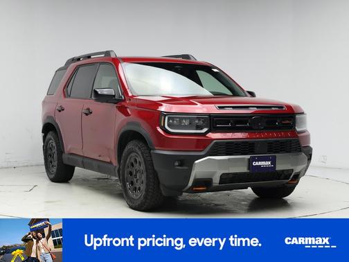 Red 2026 Honda Passport TrailSport Elite