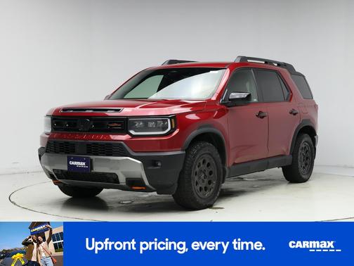 Red 2026 Honda Passport TrailSport Elite