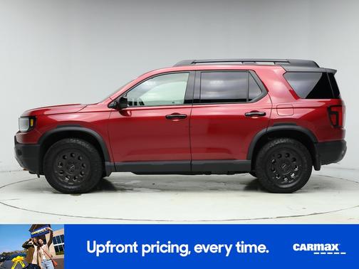 Red 2026 Honda Passport TrailSport Elite