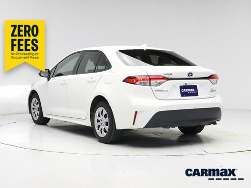 White 2023 Toyota Corolla Hybrid LE