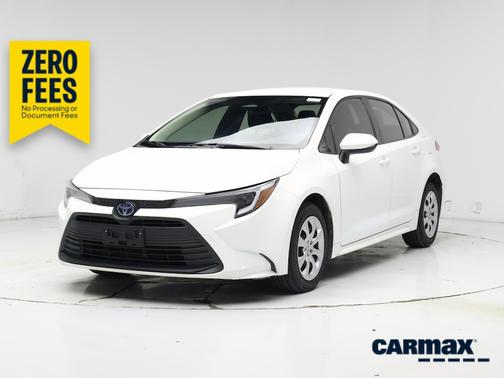 White 2023 Toyota Corolla Hybrid LE