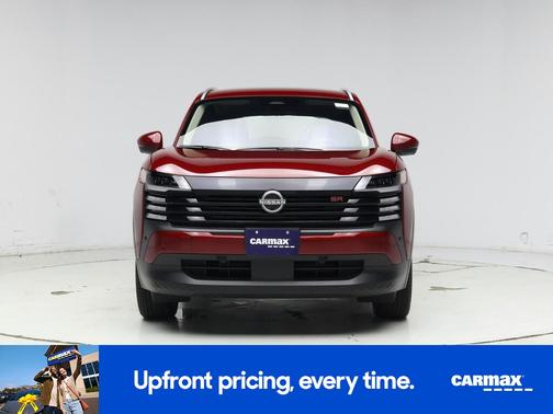 Red 2025 Nissan Kicks SR