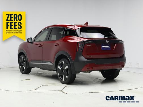 Red 2025 Nissan Kicks SR