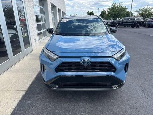 Cavalry Blue/Midnight Black Metallic 2023 Toyota RAV4 Hybrid SE
