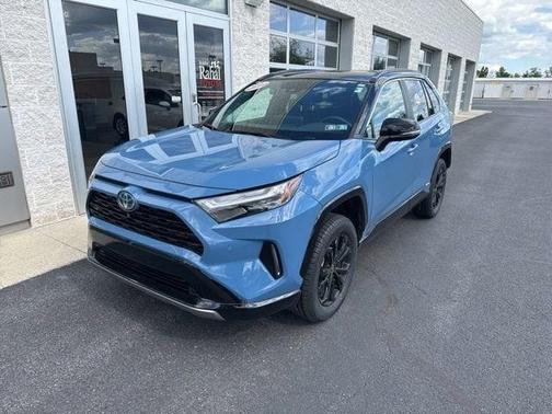 Cavalry Blue/Midnight Black Metallic 2023 Toyota RAV4 Hybrid SE