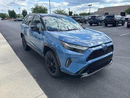 Cavalry Blue/Midnight Black Metallic 2023 Toyota RAV4 Hybrid SE