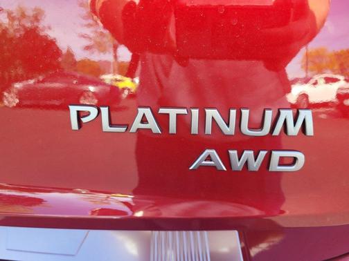 Scarlet Ember Tintcoat 2026 Nissan Rogue Platinum