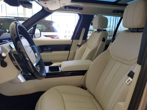 Gold 2026 Land Rover Range Rover P550e SE