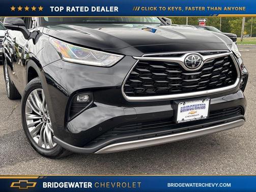 Midnight Black Metallic 2025 Toyota Highlander Hybrid Platinum