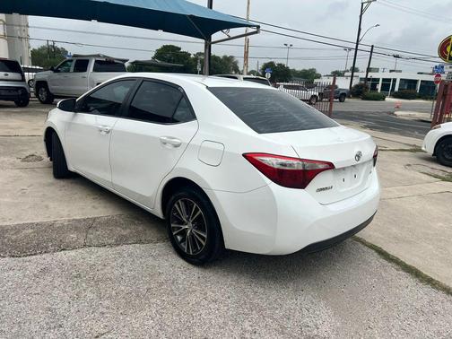 Super White 2016 Toyota Corolla LE Plus