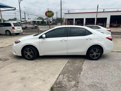 Super White 2016 Toyota Corolla LE Plus