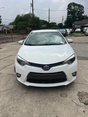 Super White 2016 Toyota Corolla LE Plus