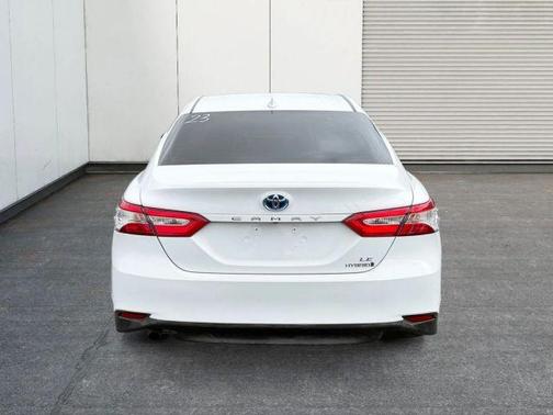 White 2020 Toyota Camry Hybrid LE