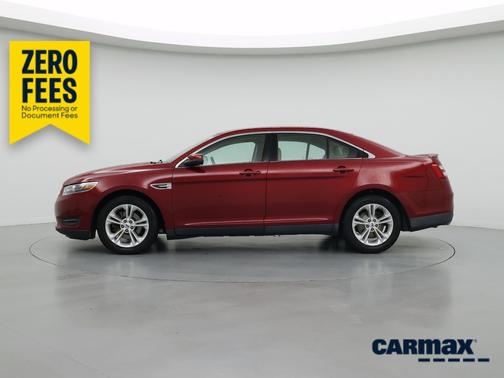 Red 2015 Ford Taurus SEL