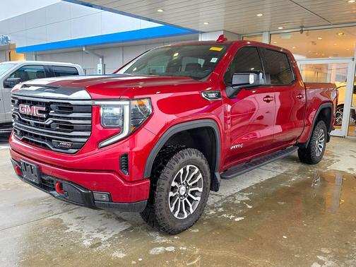 Volcanic Red Tintcoat 2023 GMC Sierra 1500 AT4