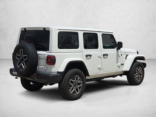 Bright White Clearcoat 2025 Jeep Wrangler 4-Door Sahara 4x4