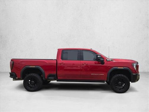 Volcanic Red Tintcoat 2024 GMC Sierra 2500 AT4X