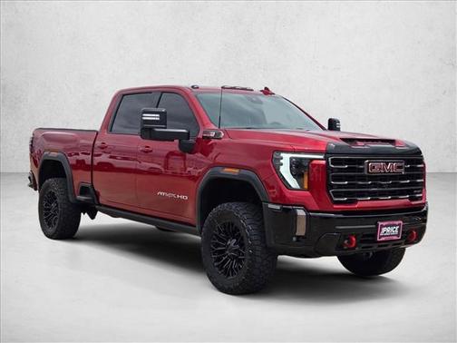 Volcanic Red Tintcoat 2024 GMC Sierra 2500 AT4X